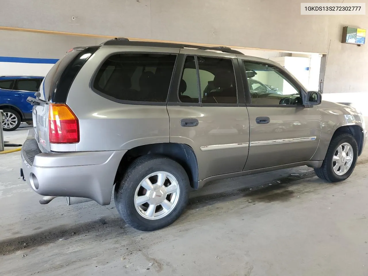 2007 GMC Envoy VIN: 1GKDS13S272302777 Lot: 69808674