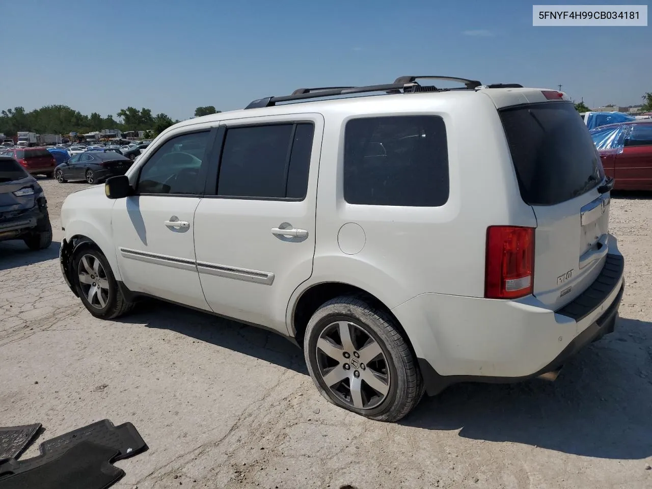 2012 Honda Pilot Touring VIN: 5FNYF4H99CB034181 Lot: 69487864