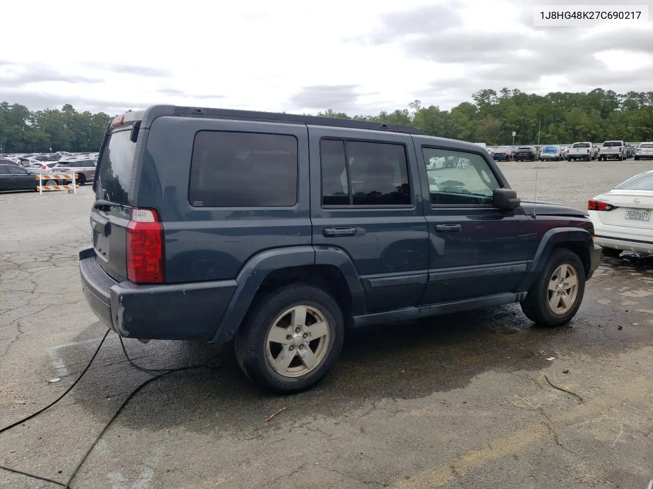 2007 Jeep Commander VIN: 1J8HG48K27C690217 Lot: 70040884