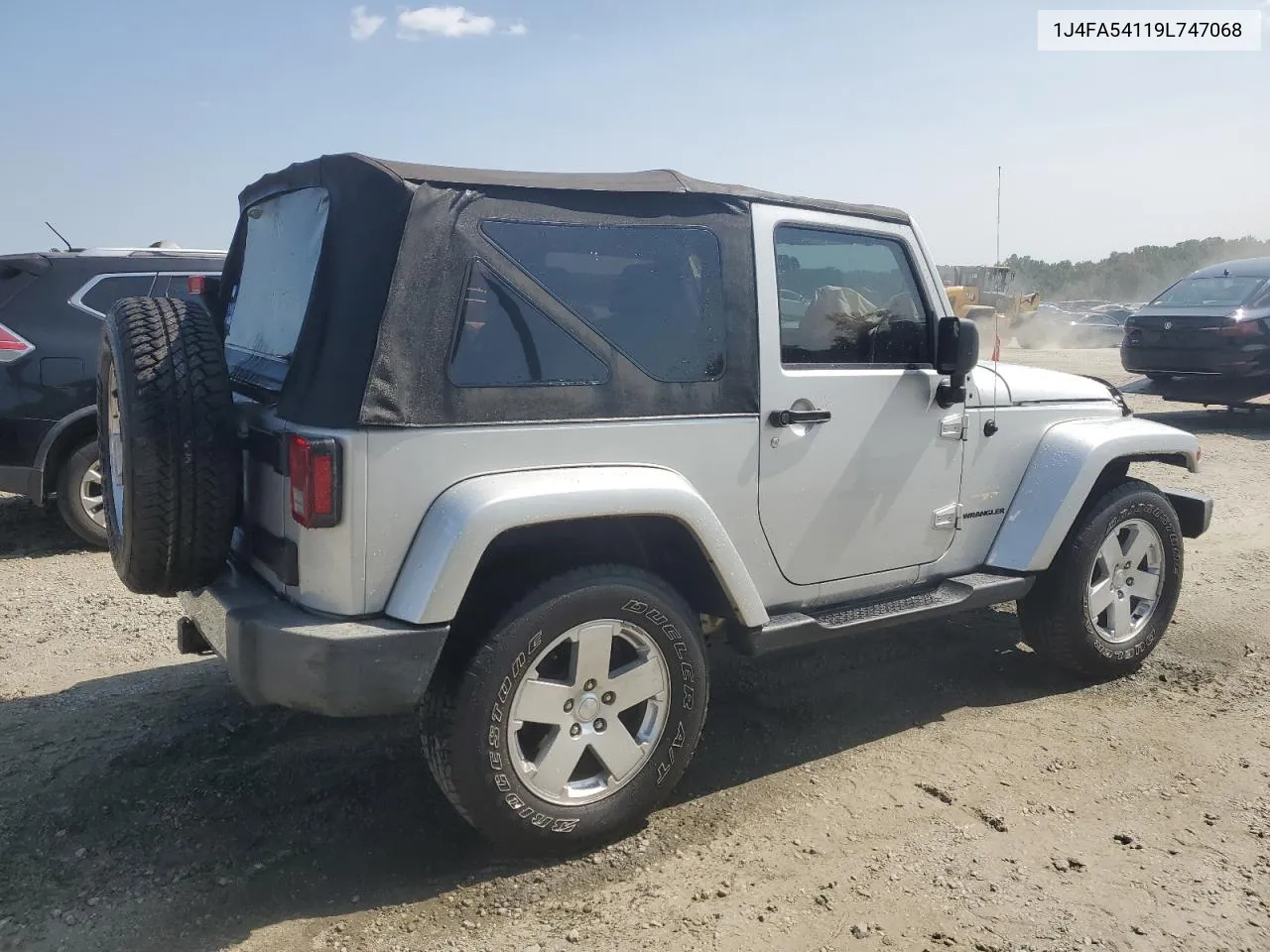 2009 Jeep Wrangler Sahara VIN: 1J4FA54119L747068 Lot: 71209904