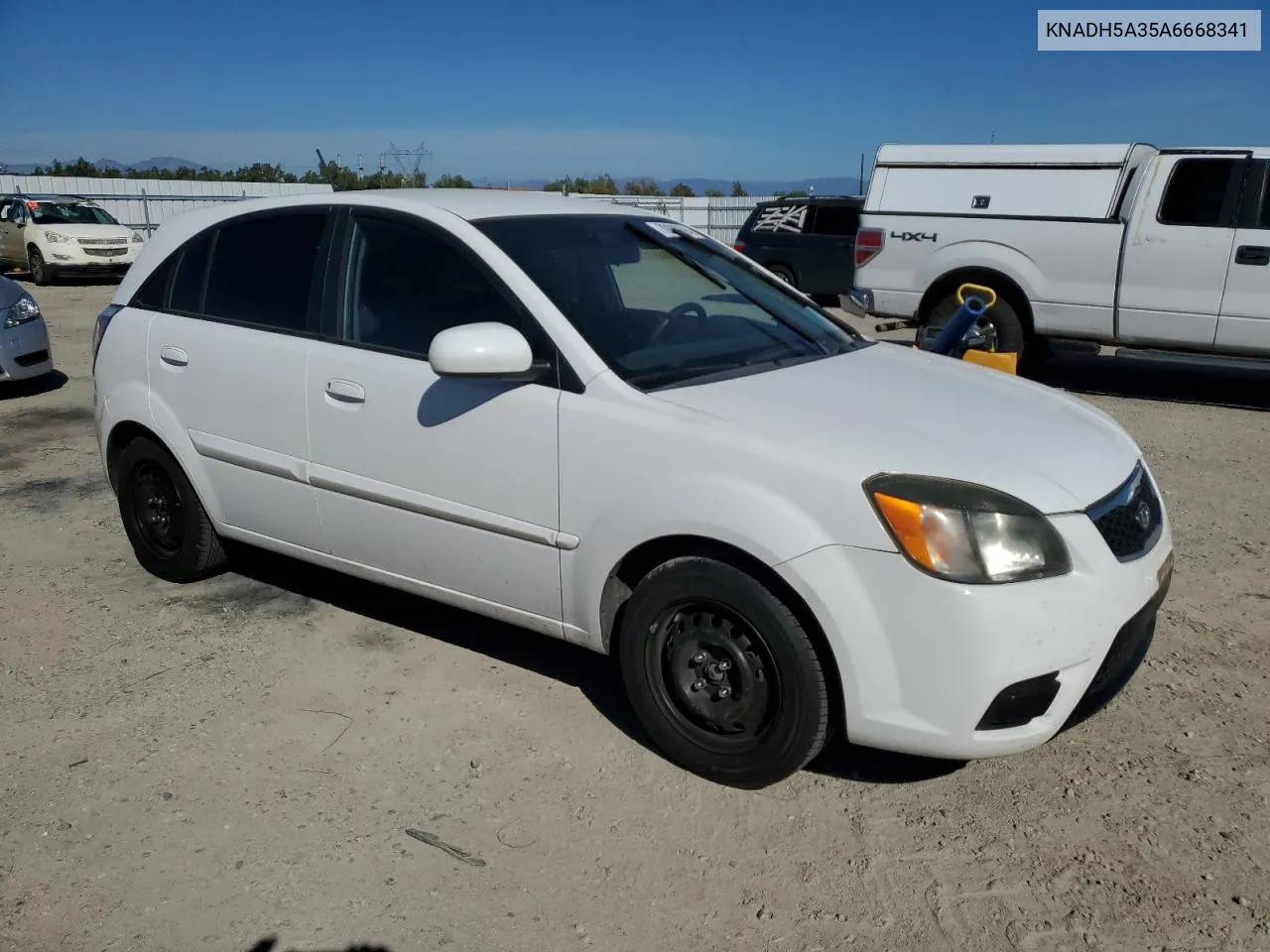 2010 Kia Rio Lx VIN: KNADH5A35A6668341 Lot: 70999694