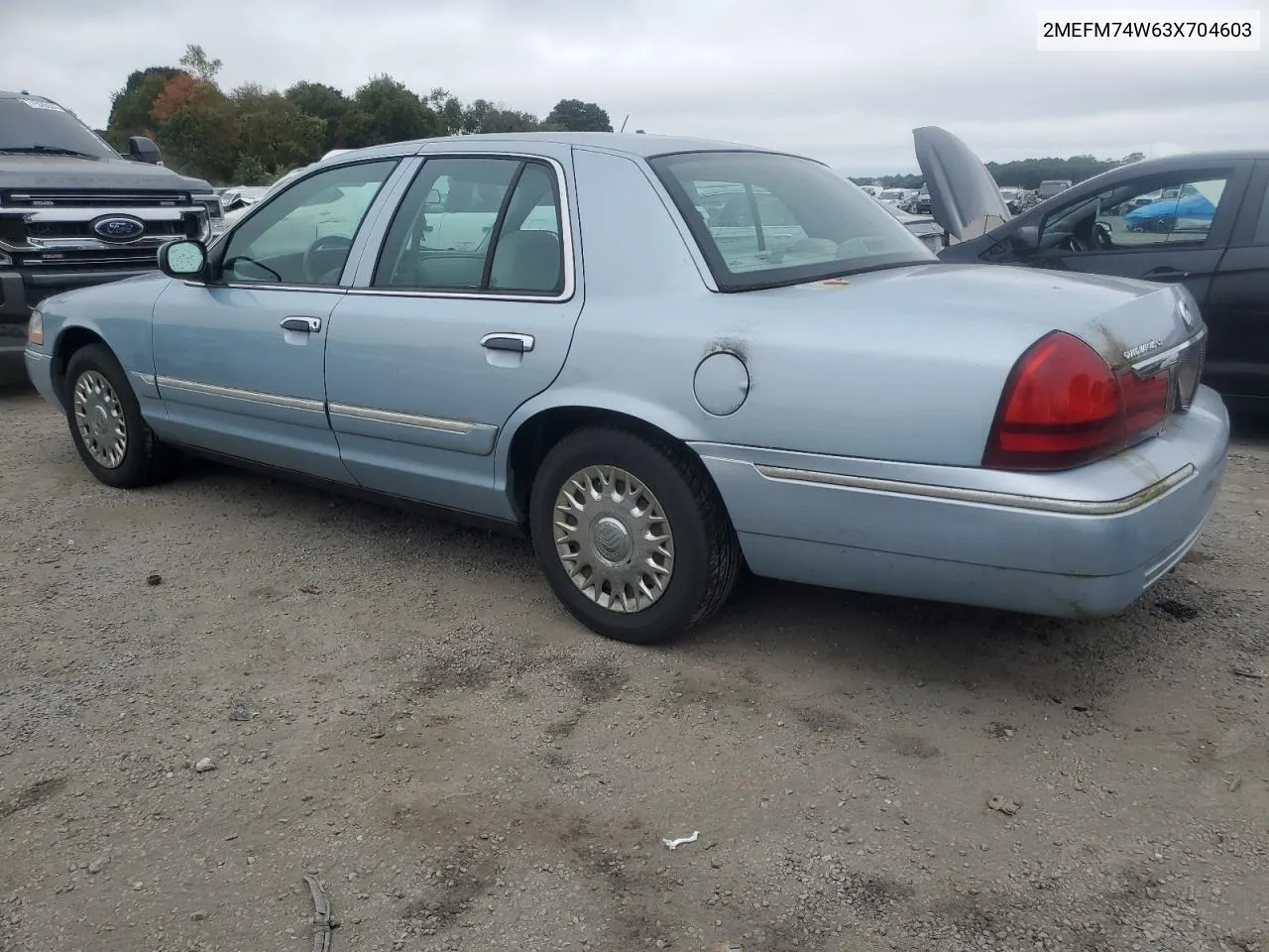 2003 Mercury Grand Marquis Gs VIN: 2MEFM74W63X704603 Lot: 72118014