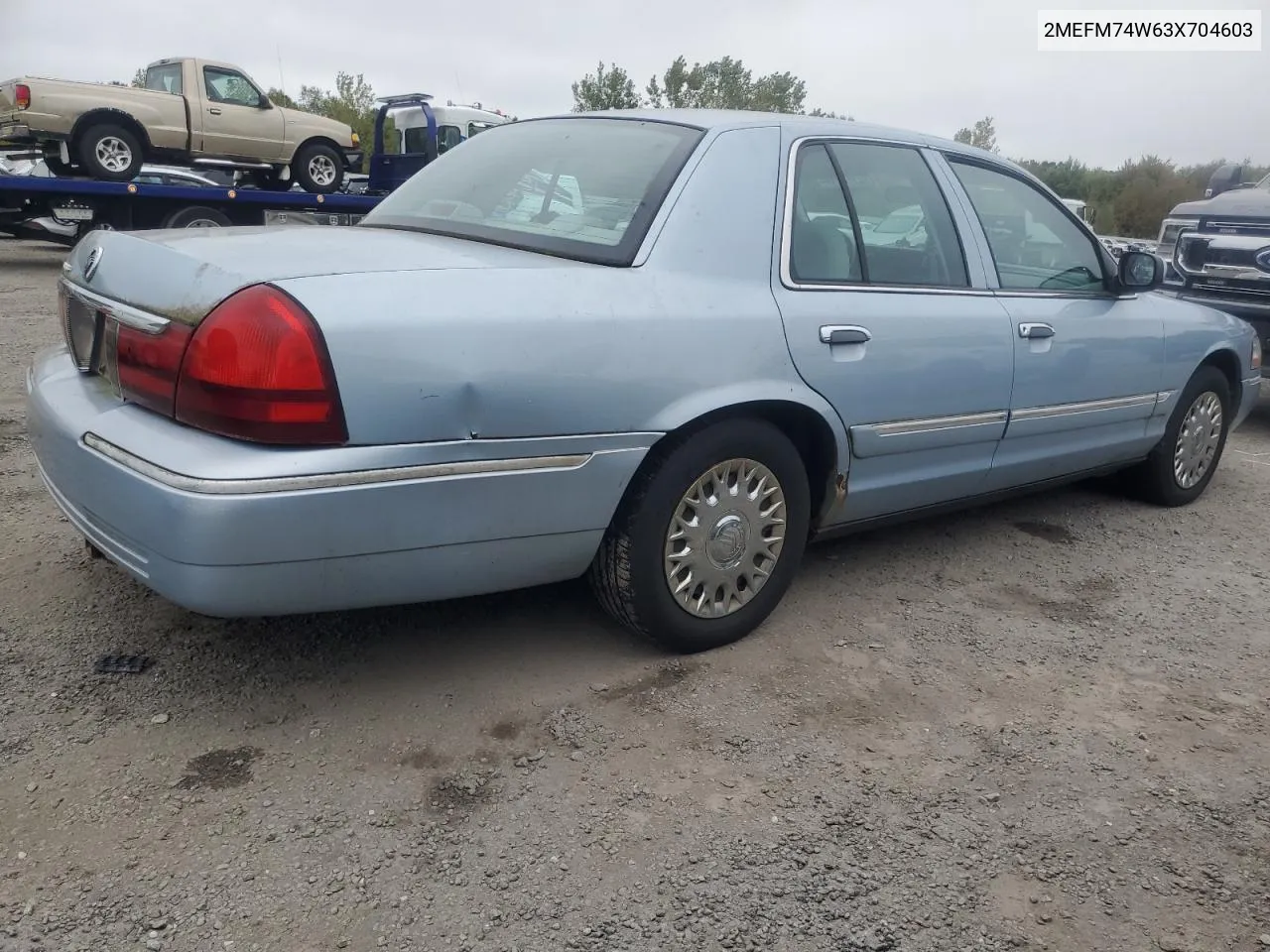 2003 Mercury Grand Marquis Gs VIN: 2MEFM74W63X704603 Lot: 72118014