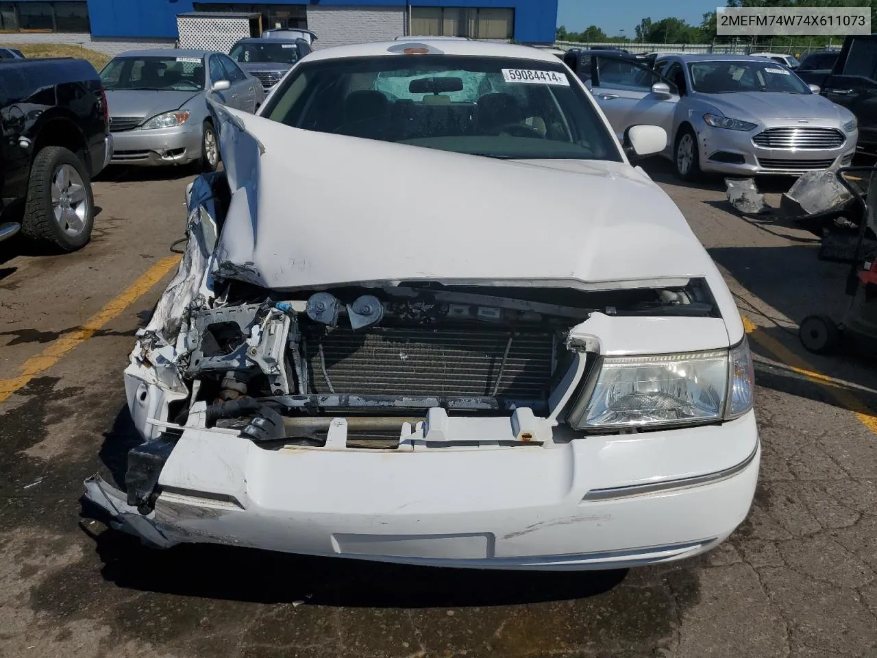 2004 Mercury Grand Marquis Gs VIN: 2MEFM74W74X611073 Lot: 59084414