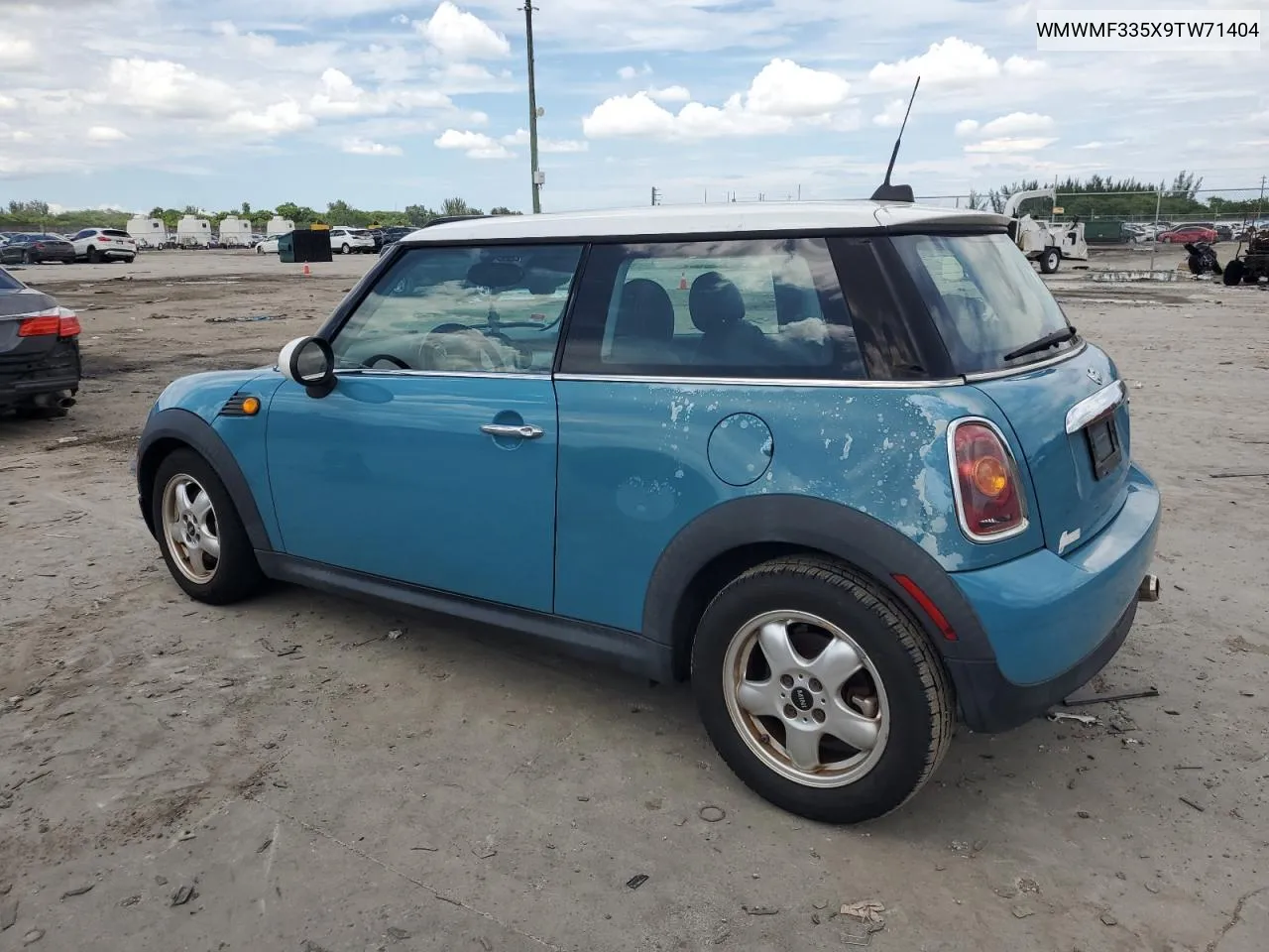 2009 Mini Cooper VIN: WMWMF335X9TW71404 Lot: 72199934