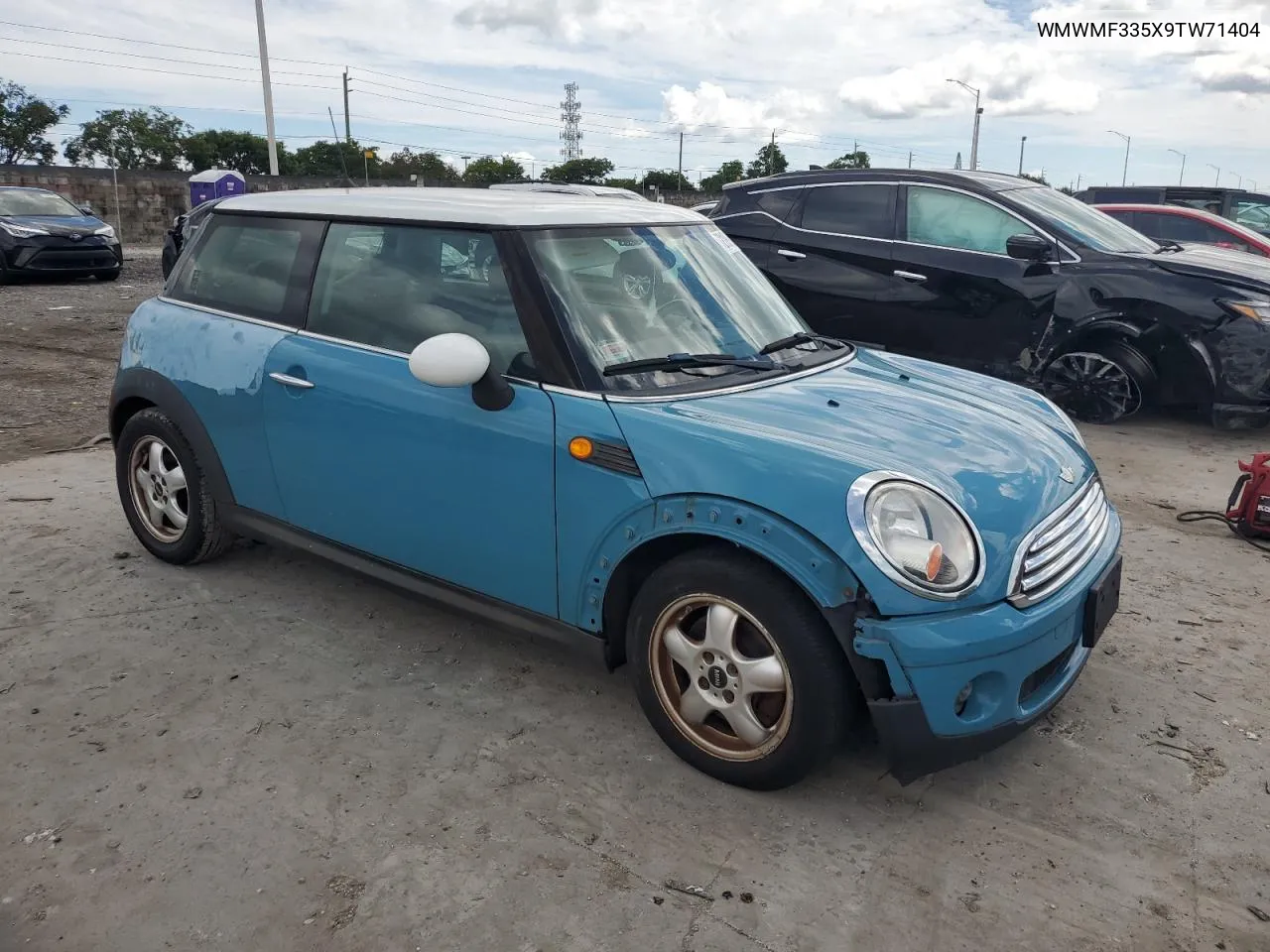 2009 Mini Cooper VIN: WMWMF335X9TW71404 Lot: 72199934