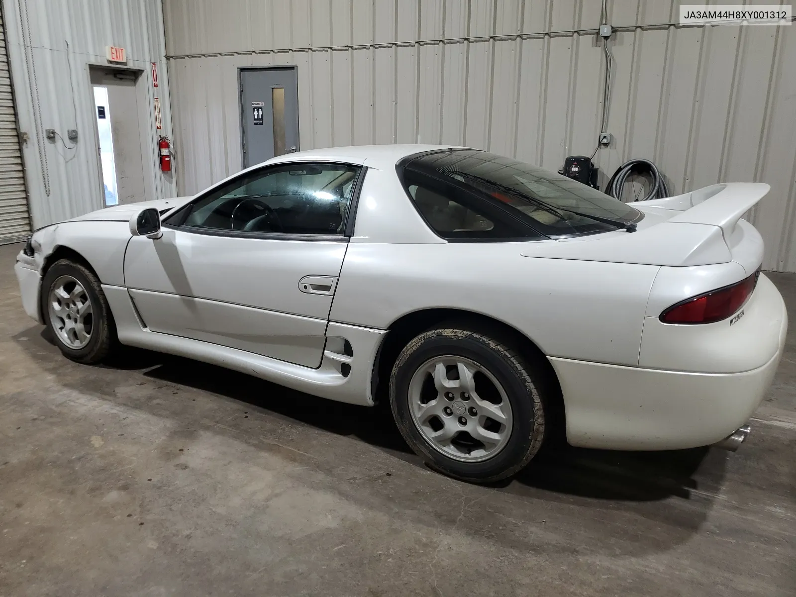 1999 Mitsubishi 3000 Gt VIN: JA3AM44H8XY001312 Lot: 65670304