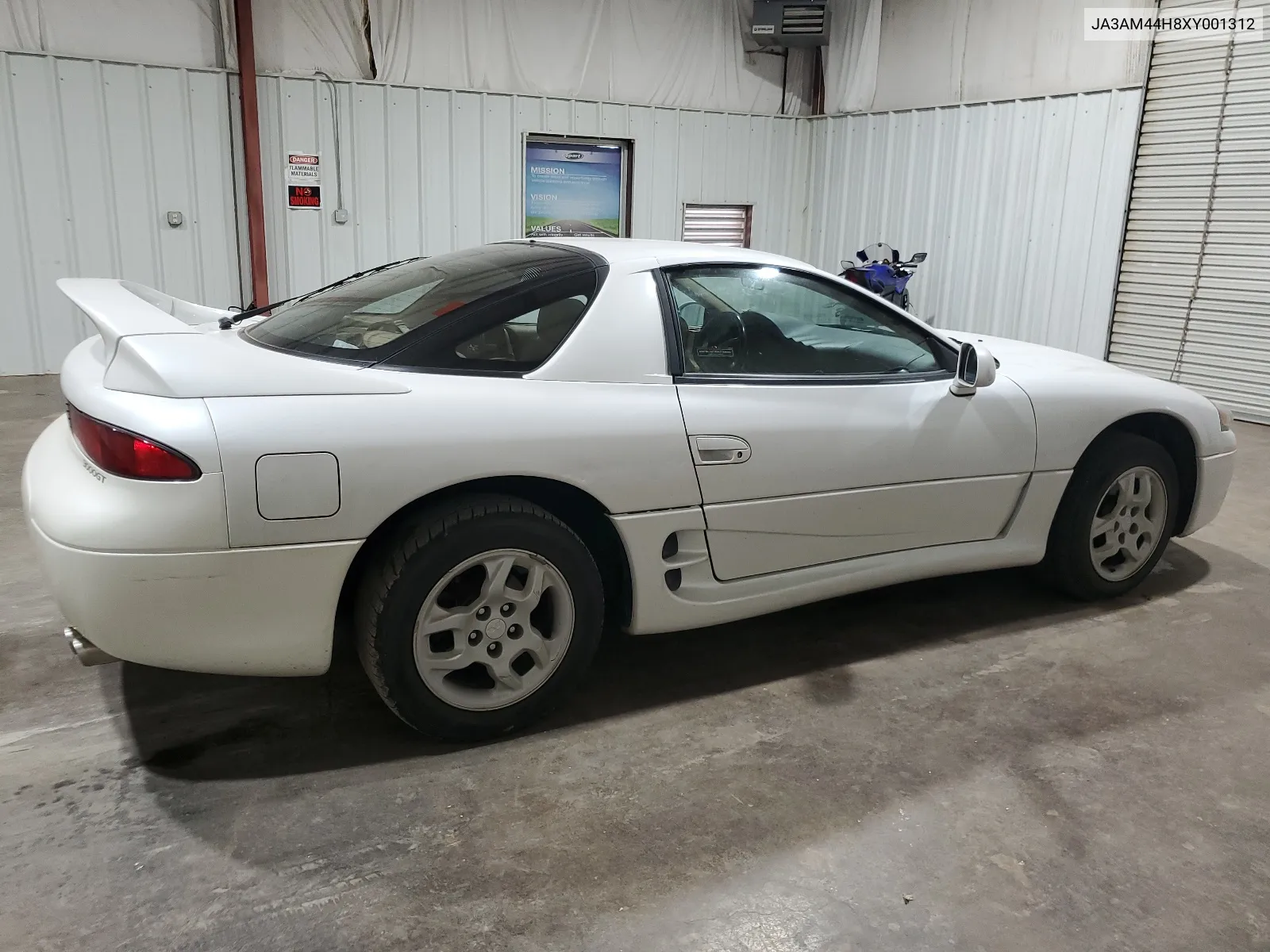 1999 Mitsubishi 3000 Gt VIN: JA3AM44H8XY001312 Lot: 65670304