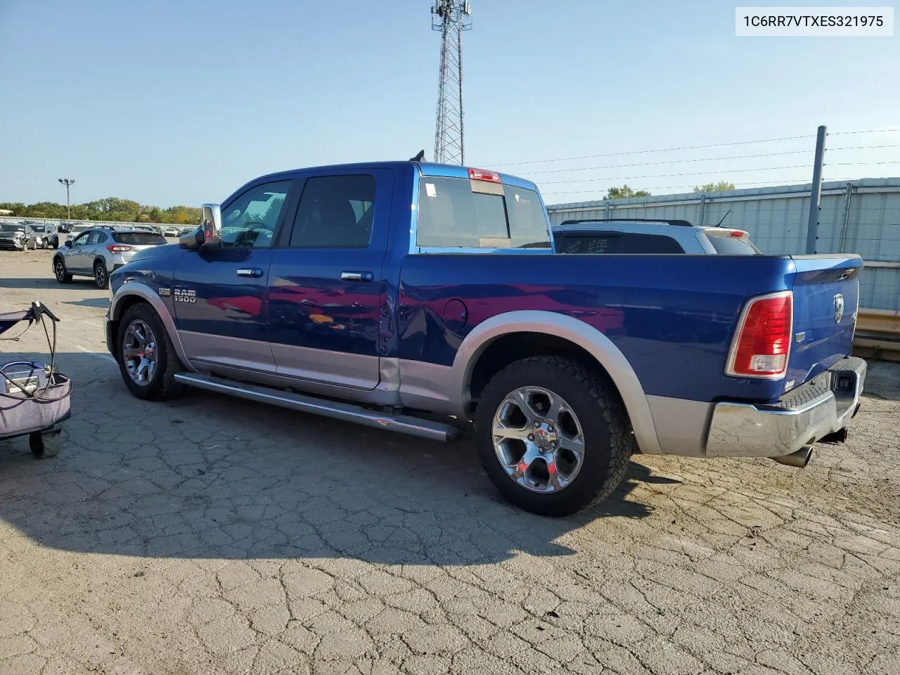 2014 Ram 1500 Laramie VIN: 1C6RR7VTXES321975 Lot: 71582044