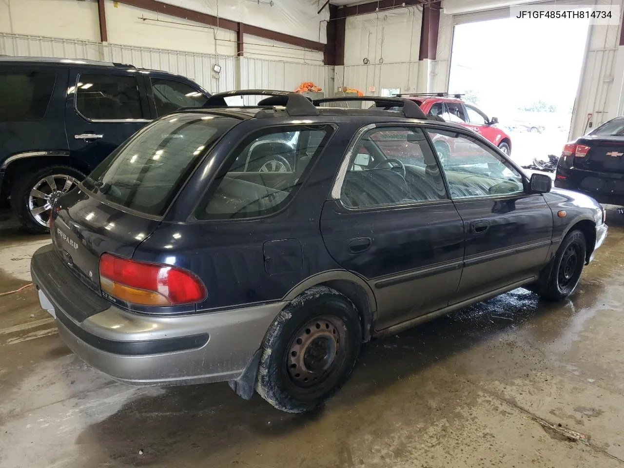 1996 Subaru Impreza Outback VIN: JF1GF4854TH814734 Lot: 69294674