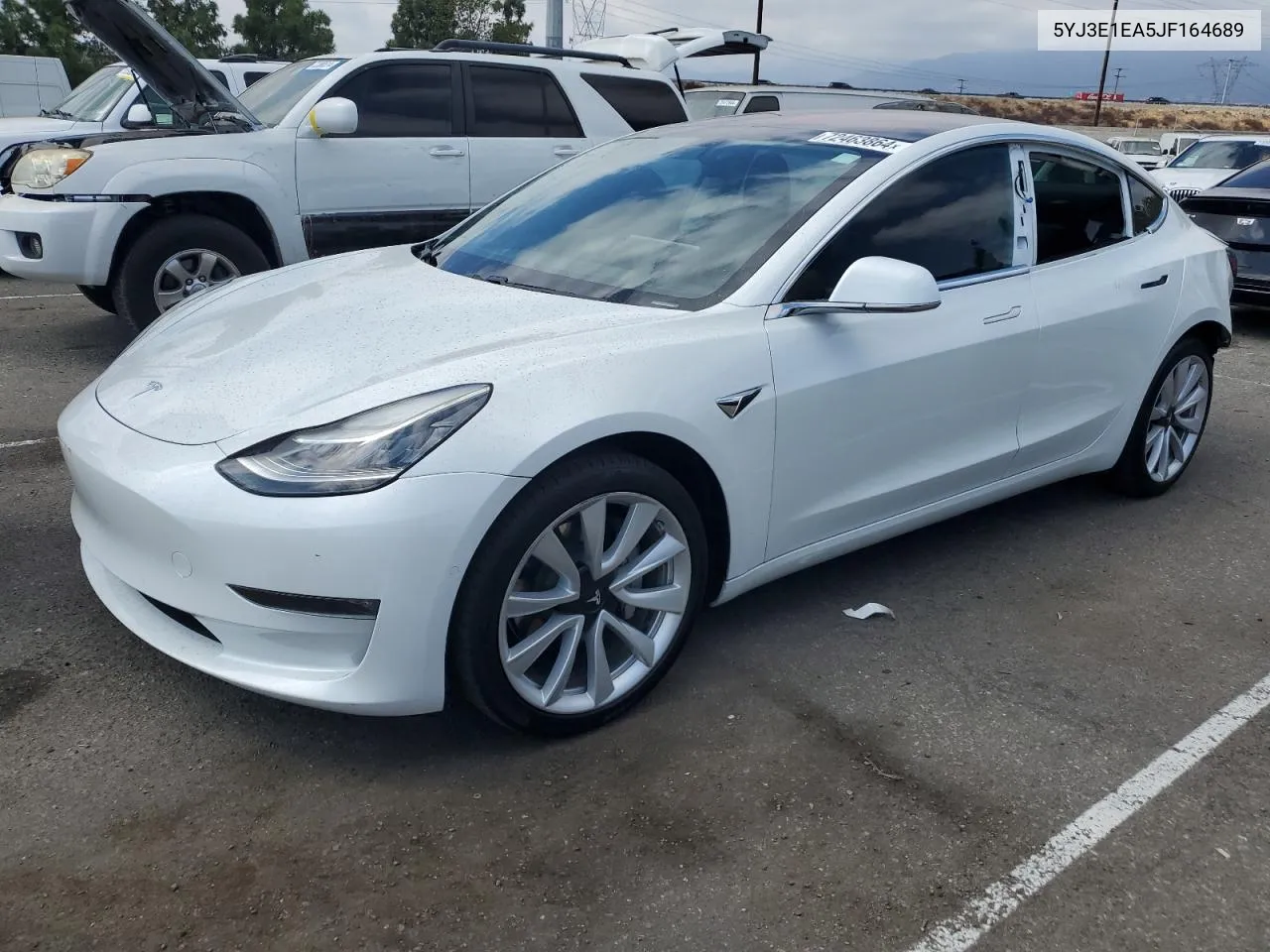 2018 Tesla Model 3 VIN: 5YJ3E1EA5JF164689 Lot: 72463864