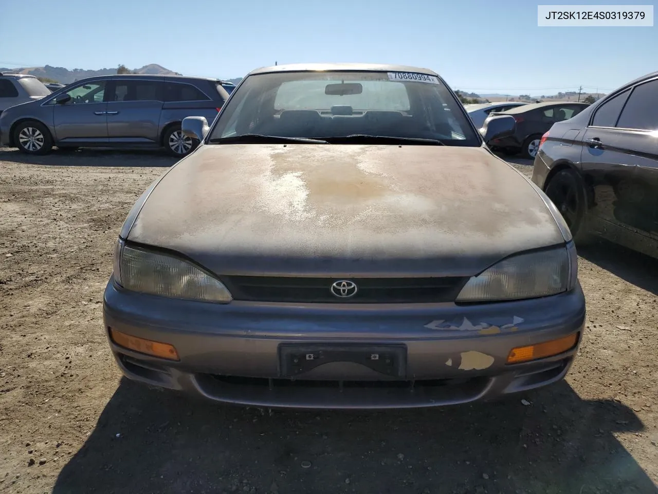 1995 Toyota Camry Le VIN: JT2SK12E4S0319379 Lot: 70880994