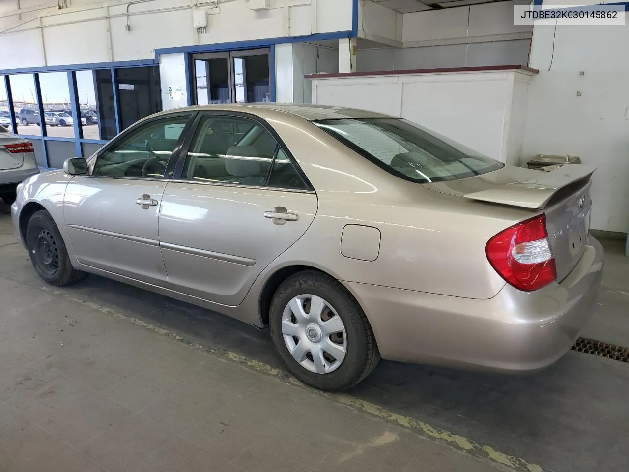 2003 Toyota Camry Le VIN: JTDBE32K030145862 Lot: 68884924