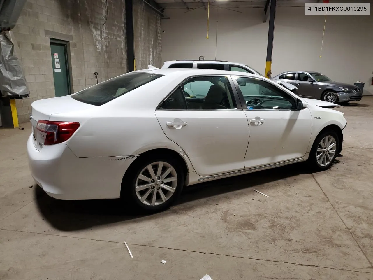 2012 Toyota Camry Hybrid VIN: 4T1BD1FKXCU010295 Lot: 70645124