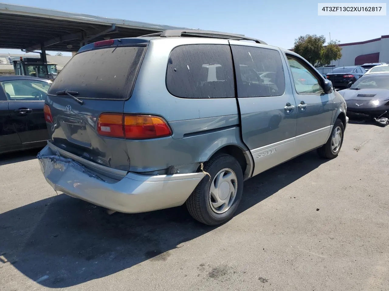 1999 Toyota Sienna Le VIN: 4T3ZF13C2XU162817 Lot: 69704604