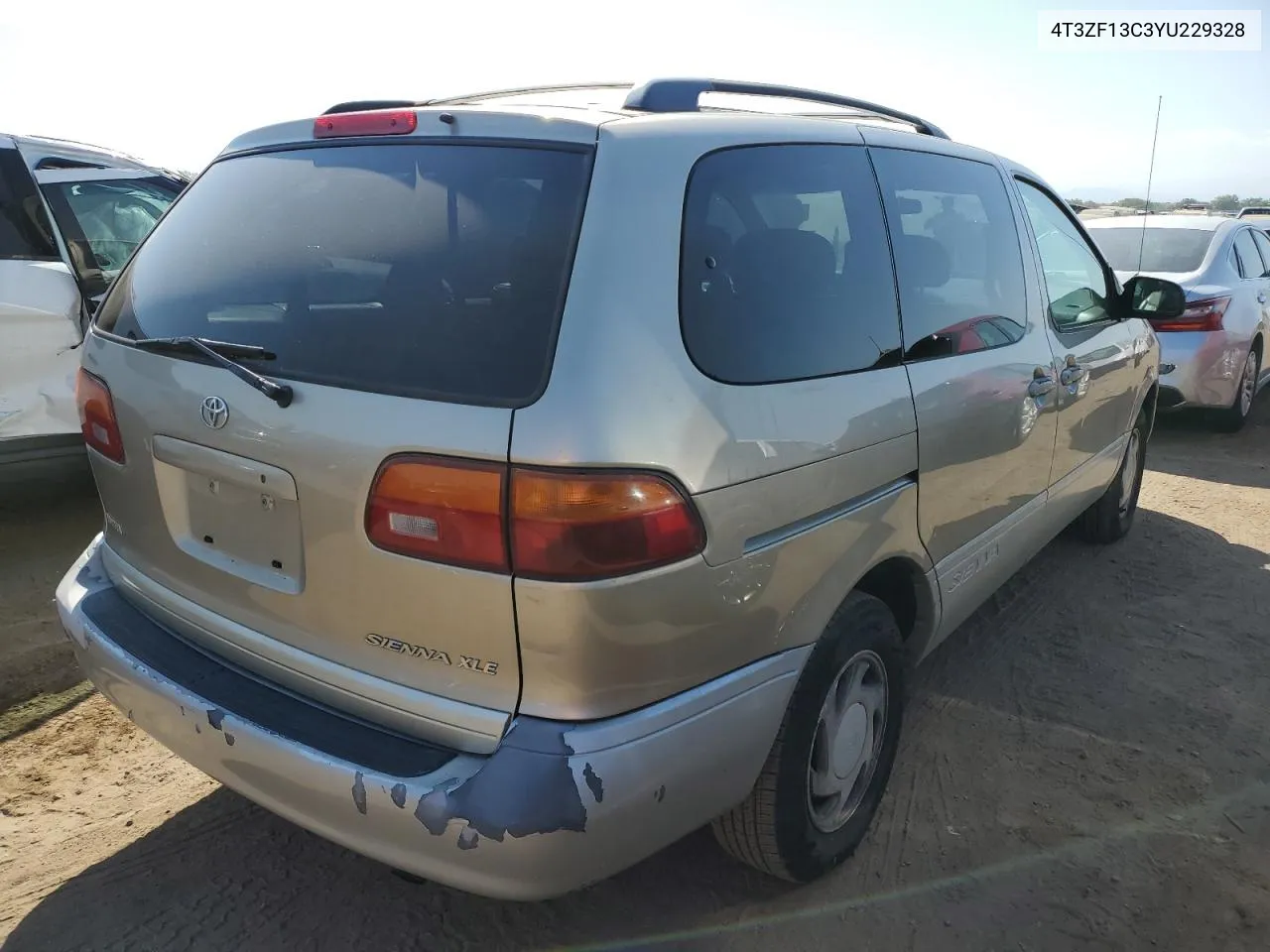 2000 Toyota Sienna Le VIN: 4T3ZF13C3YU229328 Lot: 70880244