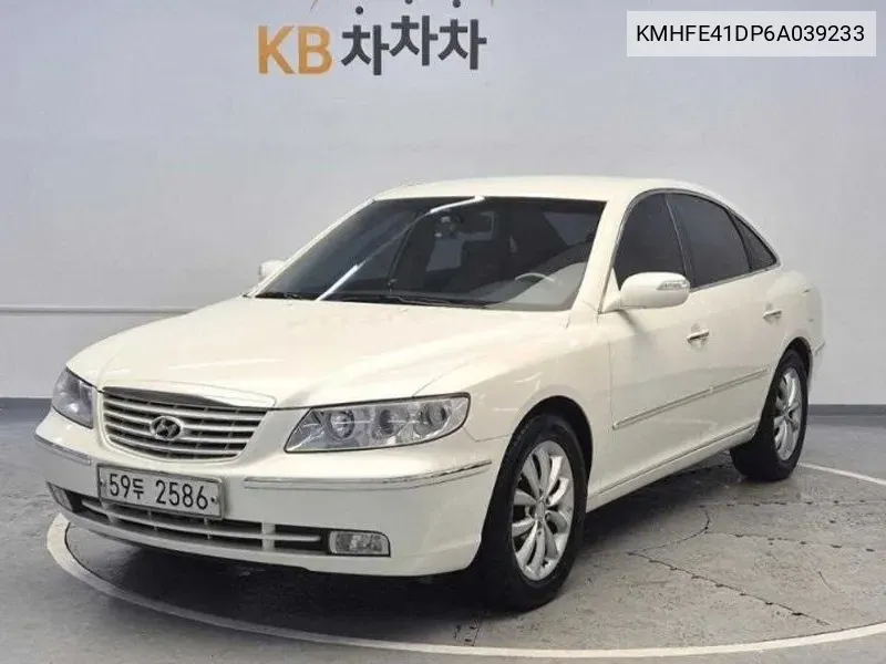 Hyundai Grandeur Tg L330 Top Basic Model VIN: KMHFE41DP6A039233 Lot: 38128056