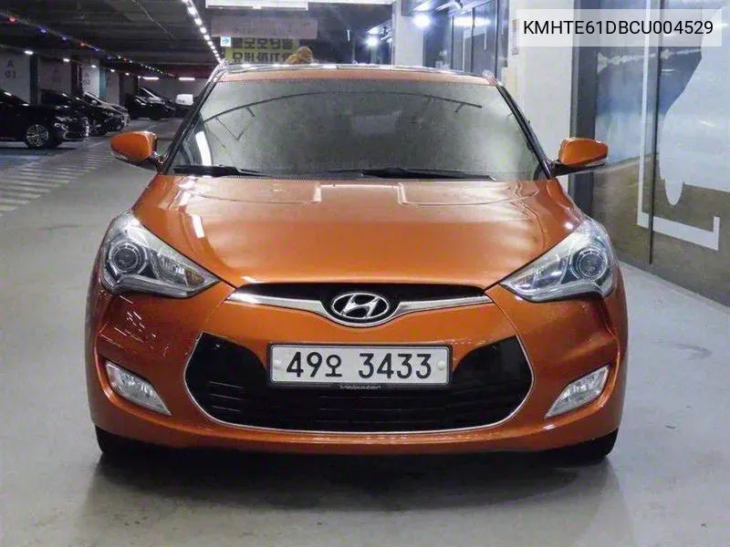 Hyundai Veloster Extreme VIN: KMHTE61DBCU004529 Lot: 38183345